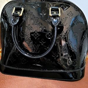 Louis Vuitton Black Monogram Alma handbag